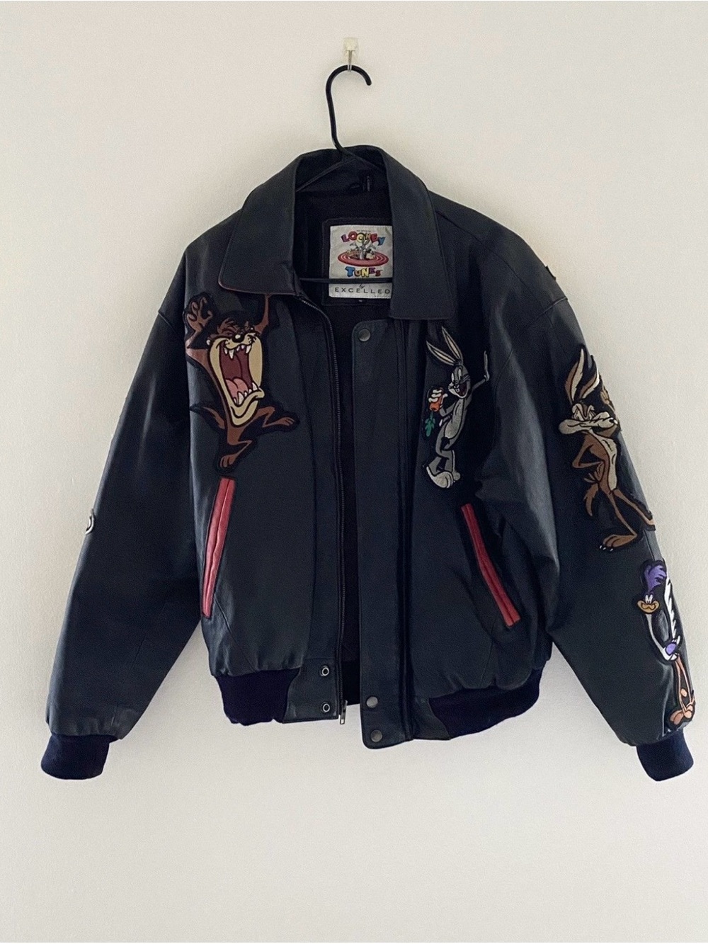 Rare 90s EXCELLED Warner Bros. Black Leather Bomber Jacket with Looney Tunes Pat